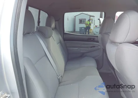 2014 Toyota Tacoma Base V6 z USA, uszkodzony, nr VIN 3TMLU4ENXEM162347